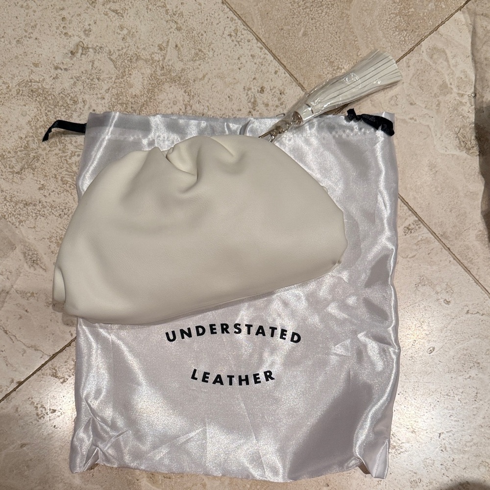Understated Leather White Clutch Bag